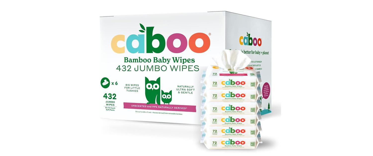 Six packs of baby wipes with a box beside them