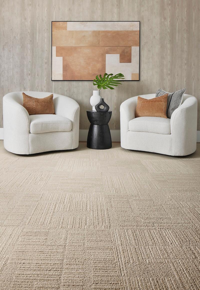 Arm chairs by tan rug