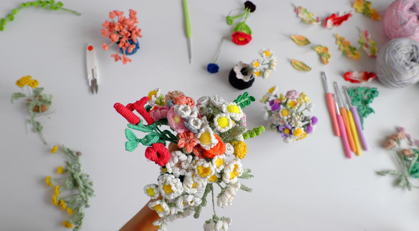 Overhead view of a bouquet of crochet flowers.