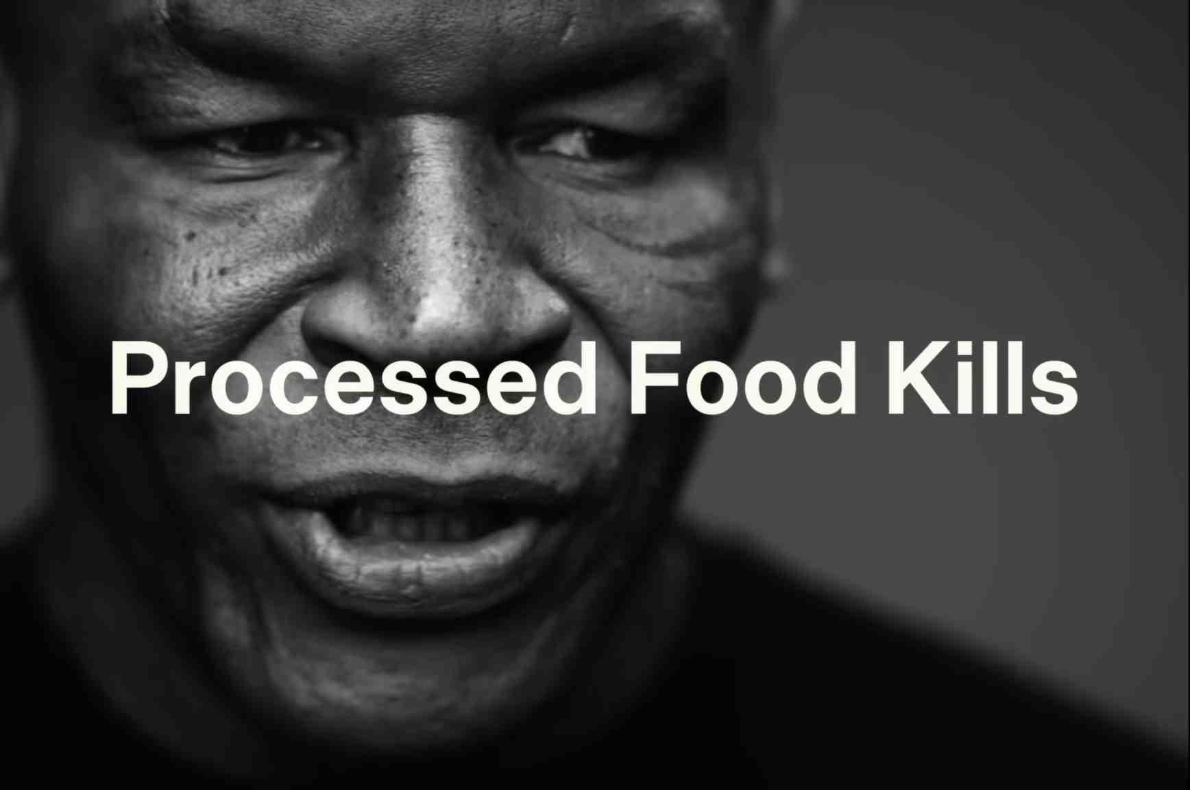 Mike Tyson is pictured speaking with the words "Processed Food Kills" overlayed.