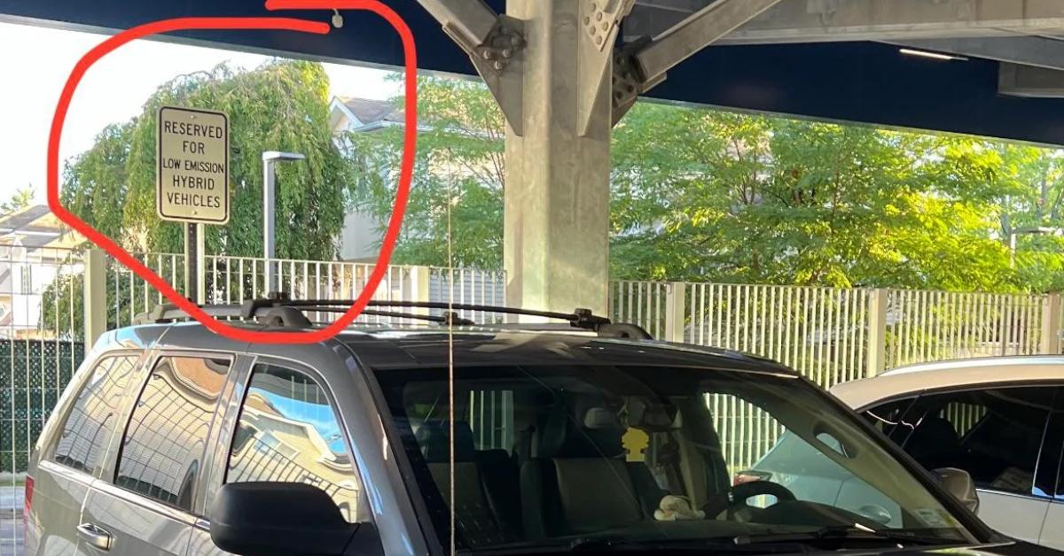 The sign designating a parking space for low emission hybrid vehicles. 