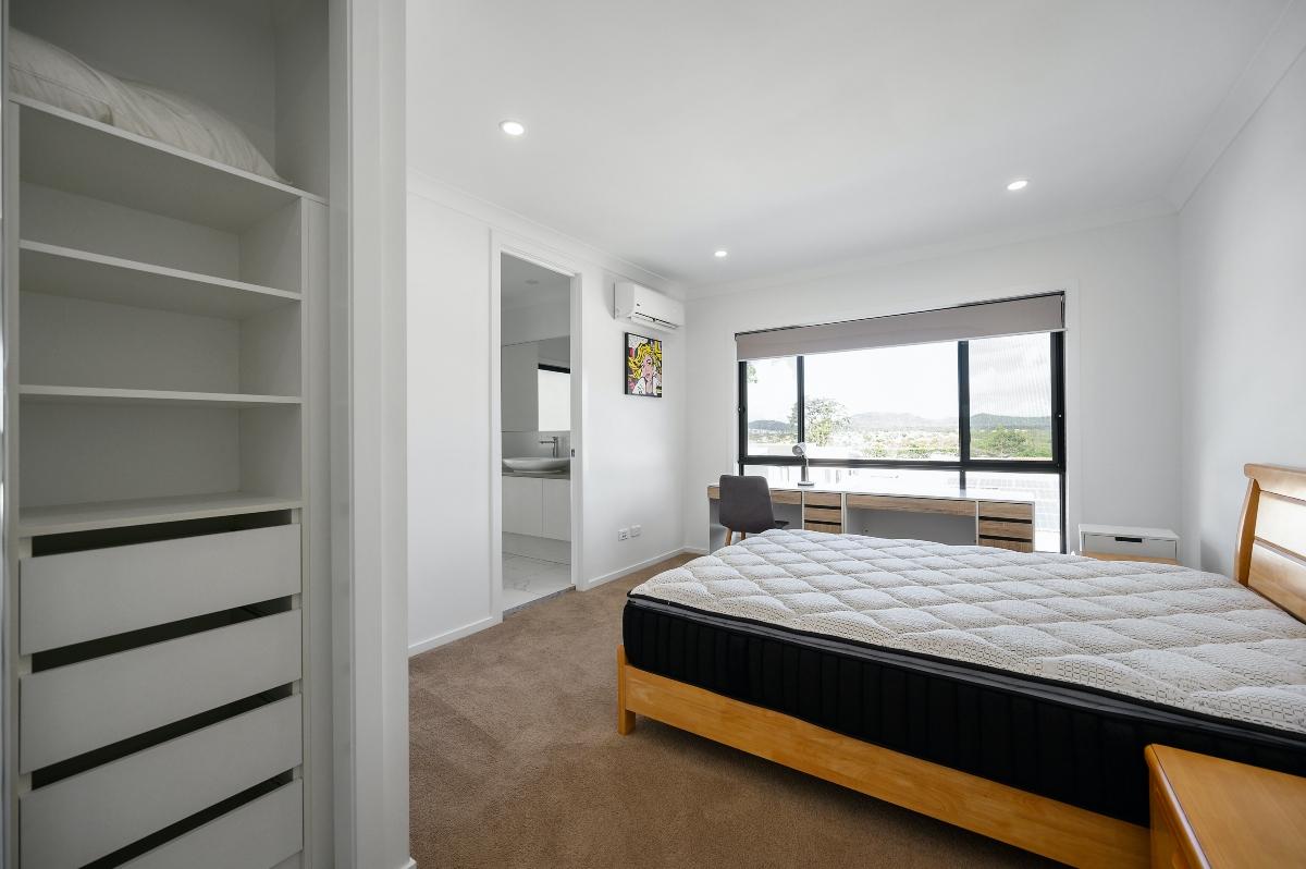 white bedroom with mattress