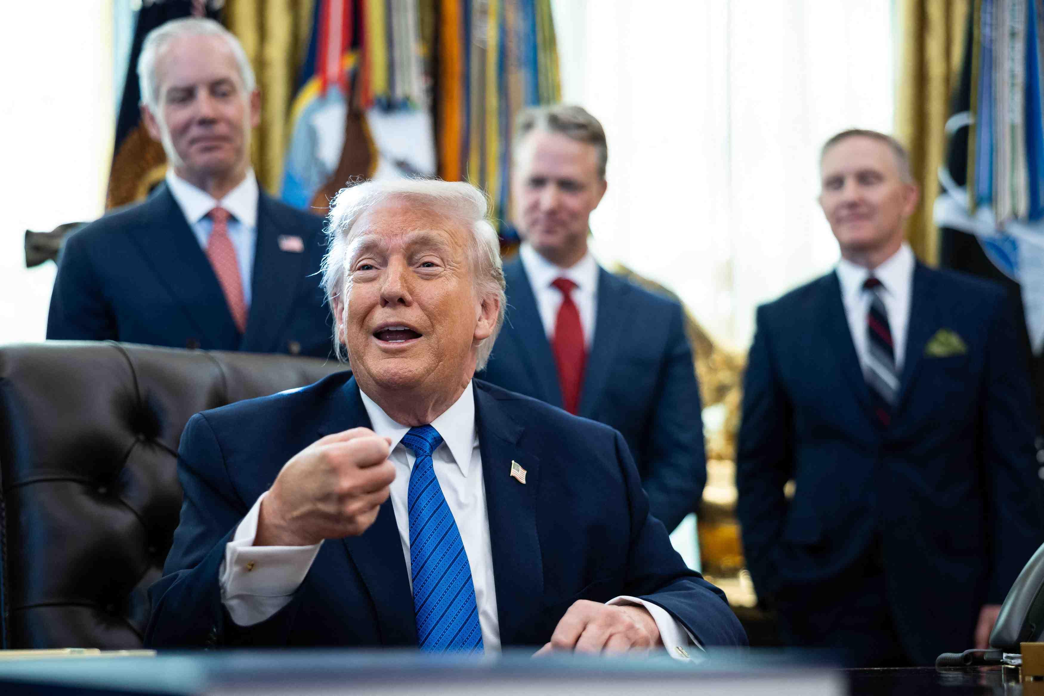President Donald Trump speaks in the Oval Office on Jan. 30.