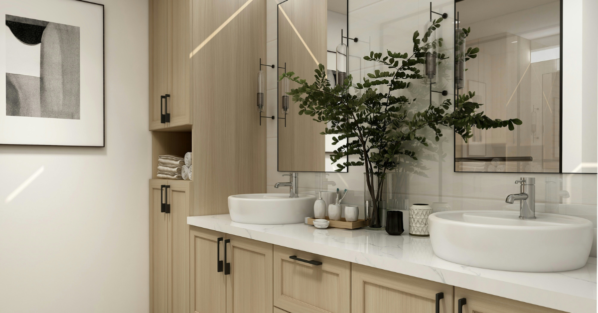 A closeup of the sinks and counter in a neutral bathroom