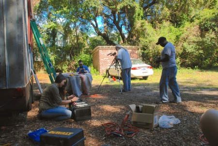 The team preps the solar accessories while Ned Ryan Doyle films